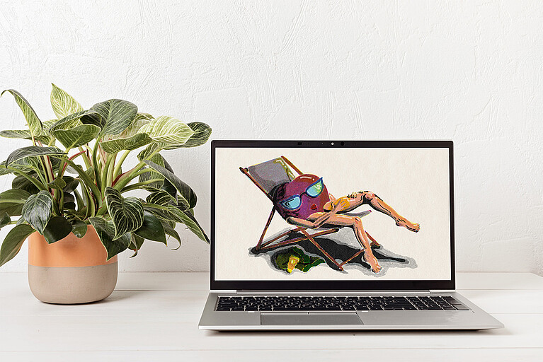 Illustration einer Kirsche auf einem Liegestuhl auf einem Laptop-Bildschirm